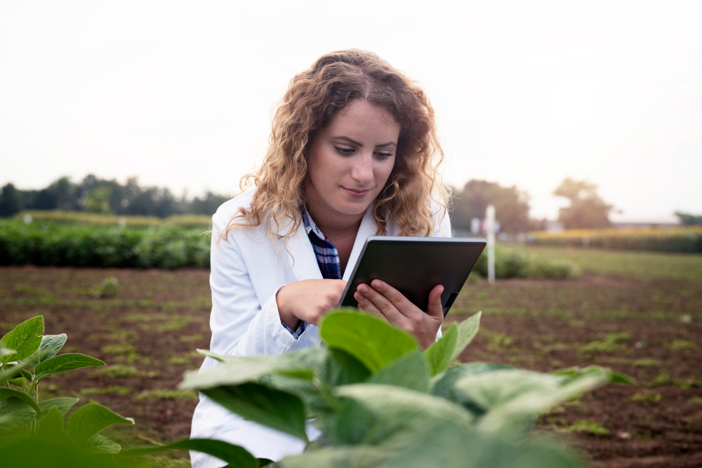 Image of agricultural studies student in a field. 