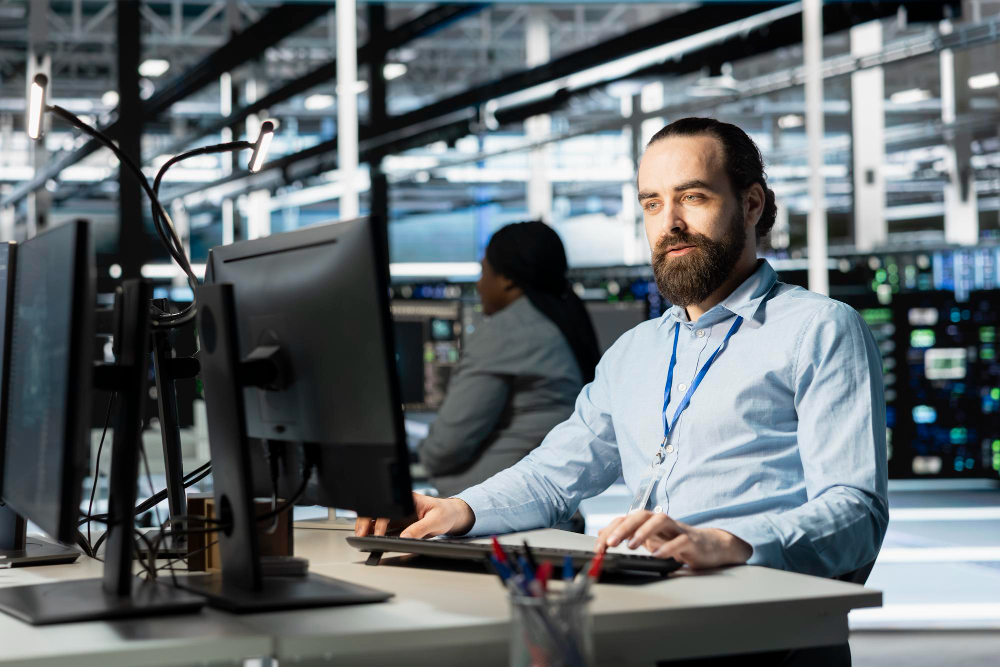 Image of business computing student at a computer. 