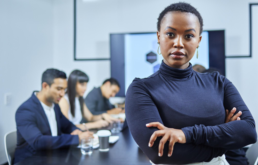 Image of business woman in front a group