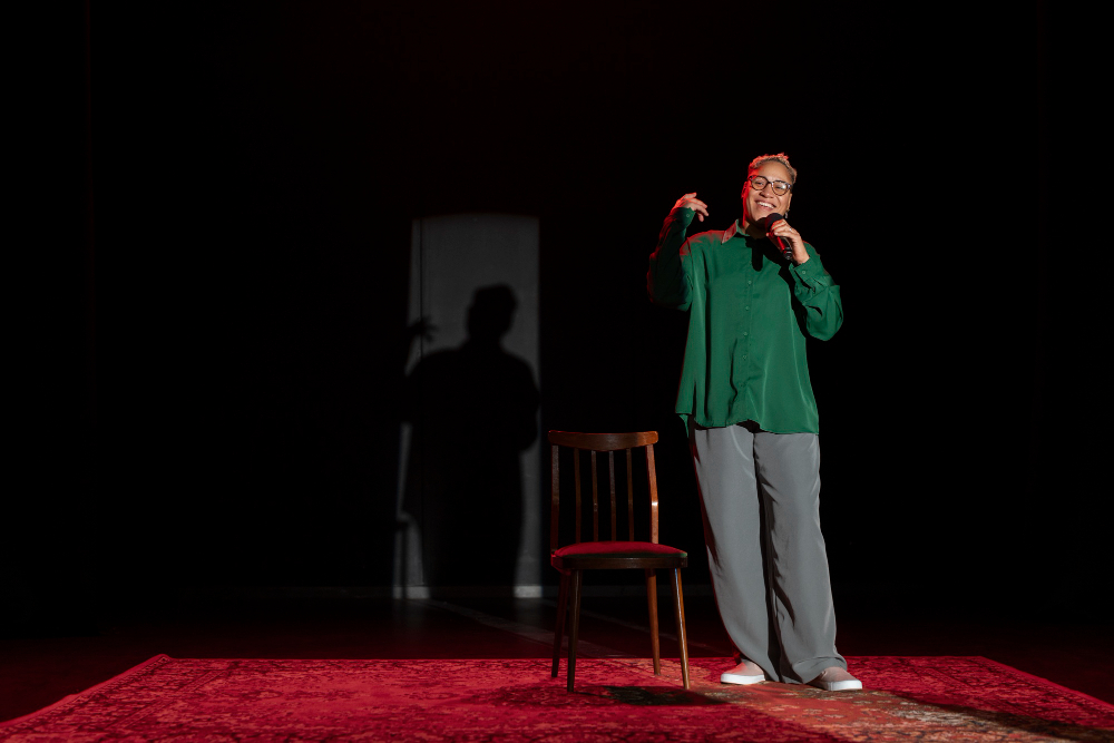Image of comedian at comedy club