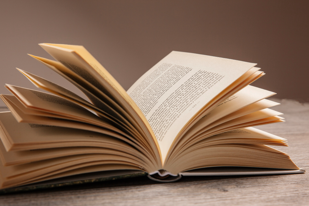 Image of book open on a table. 