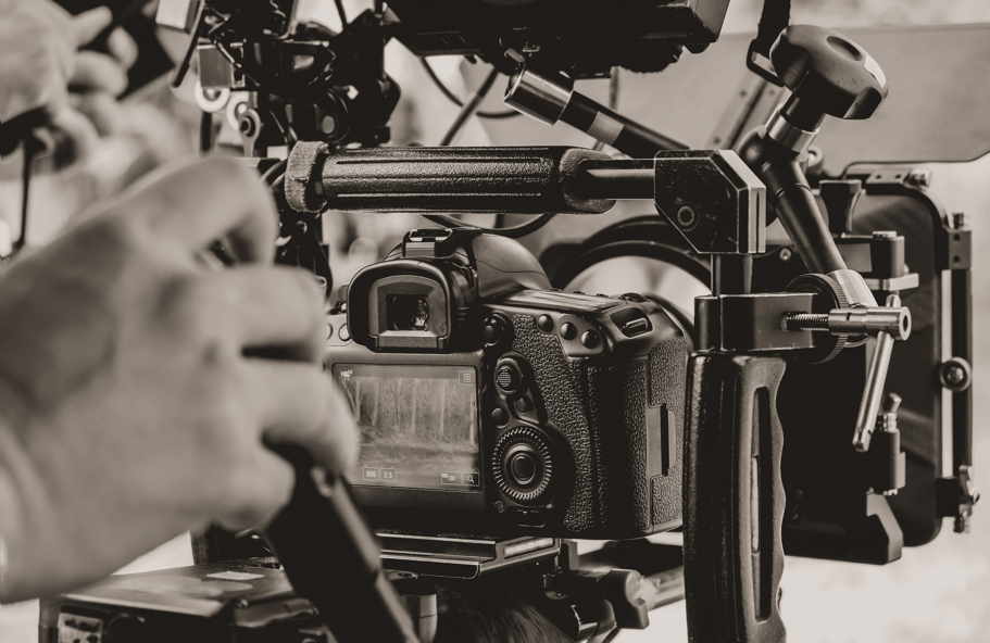 Image of person behind film equipment
