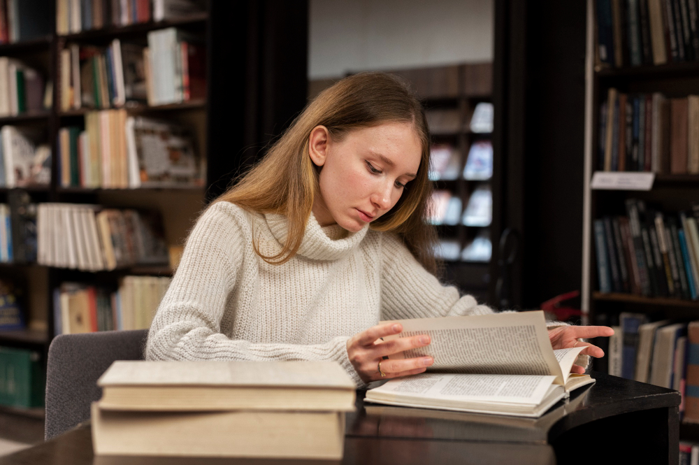 Image of a girl reading a book
