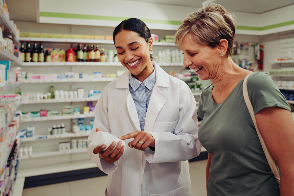 Image of Pharmacist with a patient.