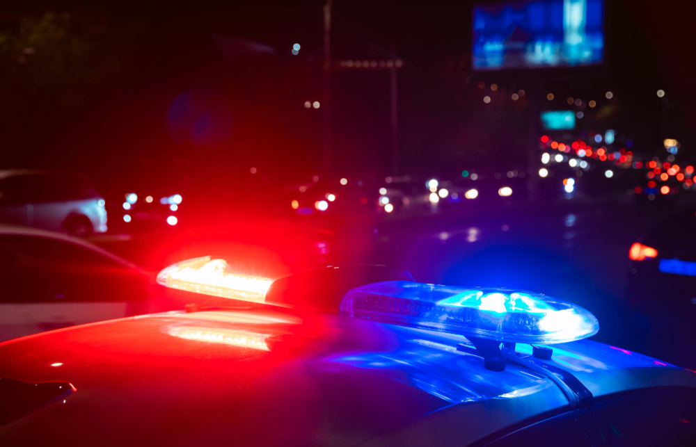 Image of the red and blue lights of a police vehicle. 