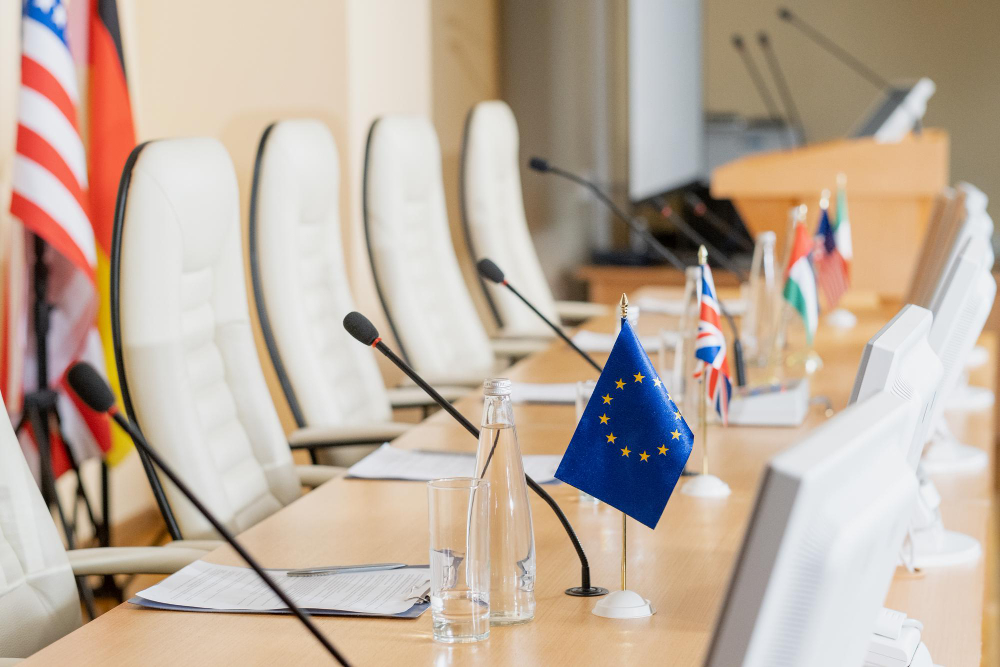 Image of political meeting chairs with flags. 