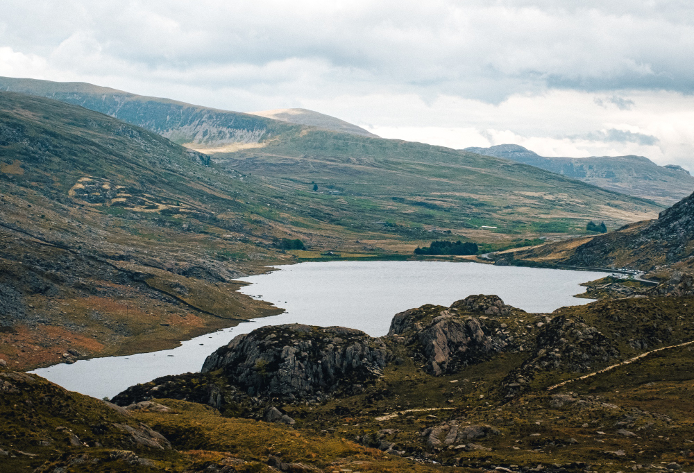 Image of Snowdonia mountain range and lake in Wales
