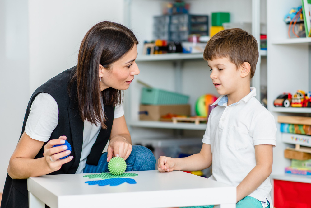 Image of a child with a SEND teacher