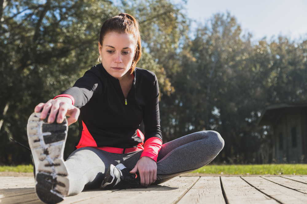Image of woman exercising with data graphics. 