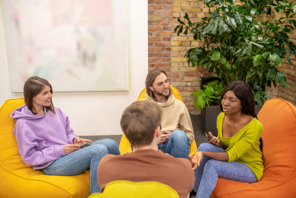 Image of a youth worker with a group of young people. 