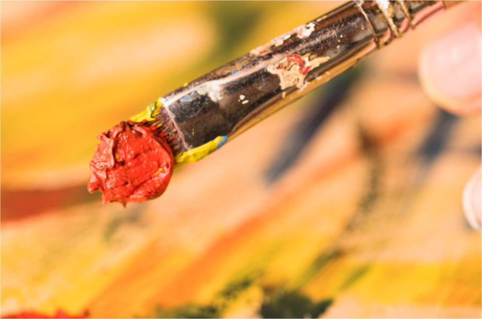 Image of oil paints and brushes to depict A Level art and design