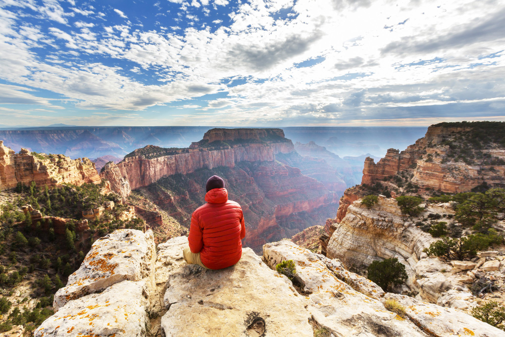 Image of man looking at panoramic over mountains